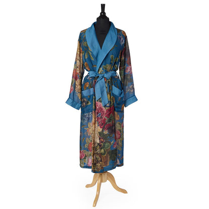 Primula Print Teal Robe in sheer modal-cupro, floral pattern, blue collar, belt, cuffs, two pockets; below-knee. Sizes XS-XL.
