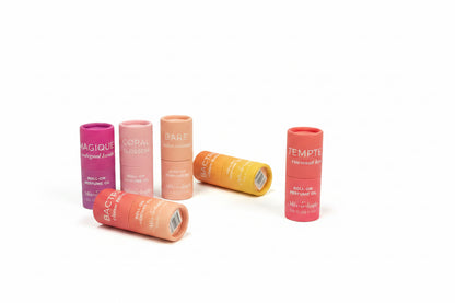 Seven alcohol-free Mini Rollerball Perfume tubes, pink to orange, for sensitive noses. Available in keychain size.