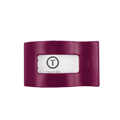 Mulberry Medium Flat Rectangle Hair Clip by TELETIES in vibrant mulberry purple, featuring a clear center window with the “TELETIES” name and circular logo. Available in medium size.