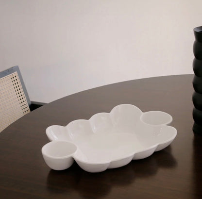 The VIDA Havana Double Dip is a white bowl with multiple rounded sections and a unique shape. Available in small and large sizes.