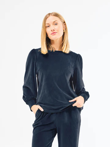 Chelsea Pullover shown; soft knit, relaxed fit, long sleeves. Available in sizes XS–XL.