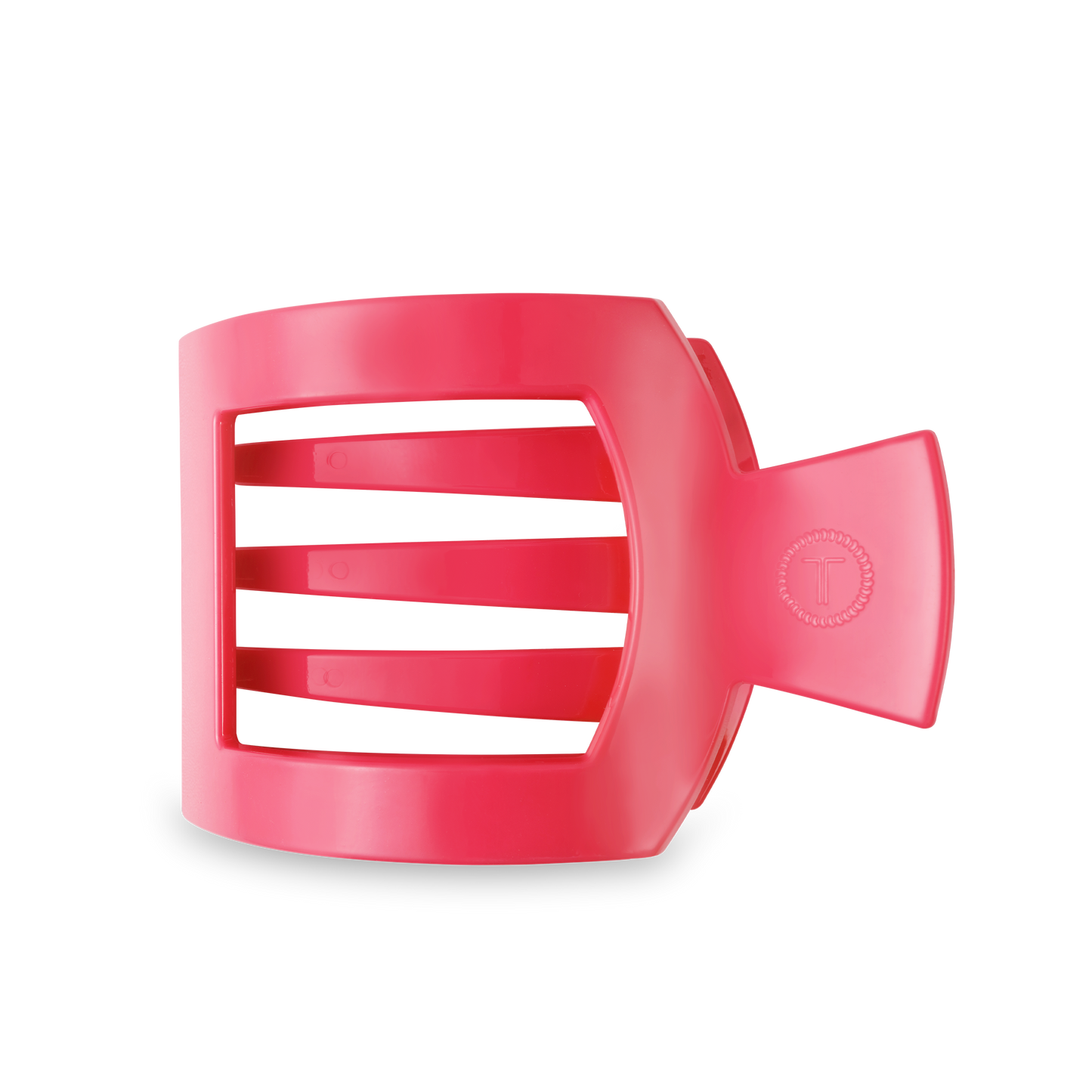 The TELETIES Square Flat Hair Clip in red is a rectangular plastic accessory with three horizontal bars and a large side handle for enhanced grip. Available sizes: Small, Large.