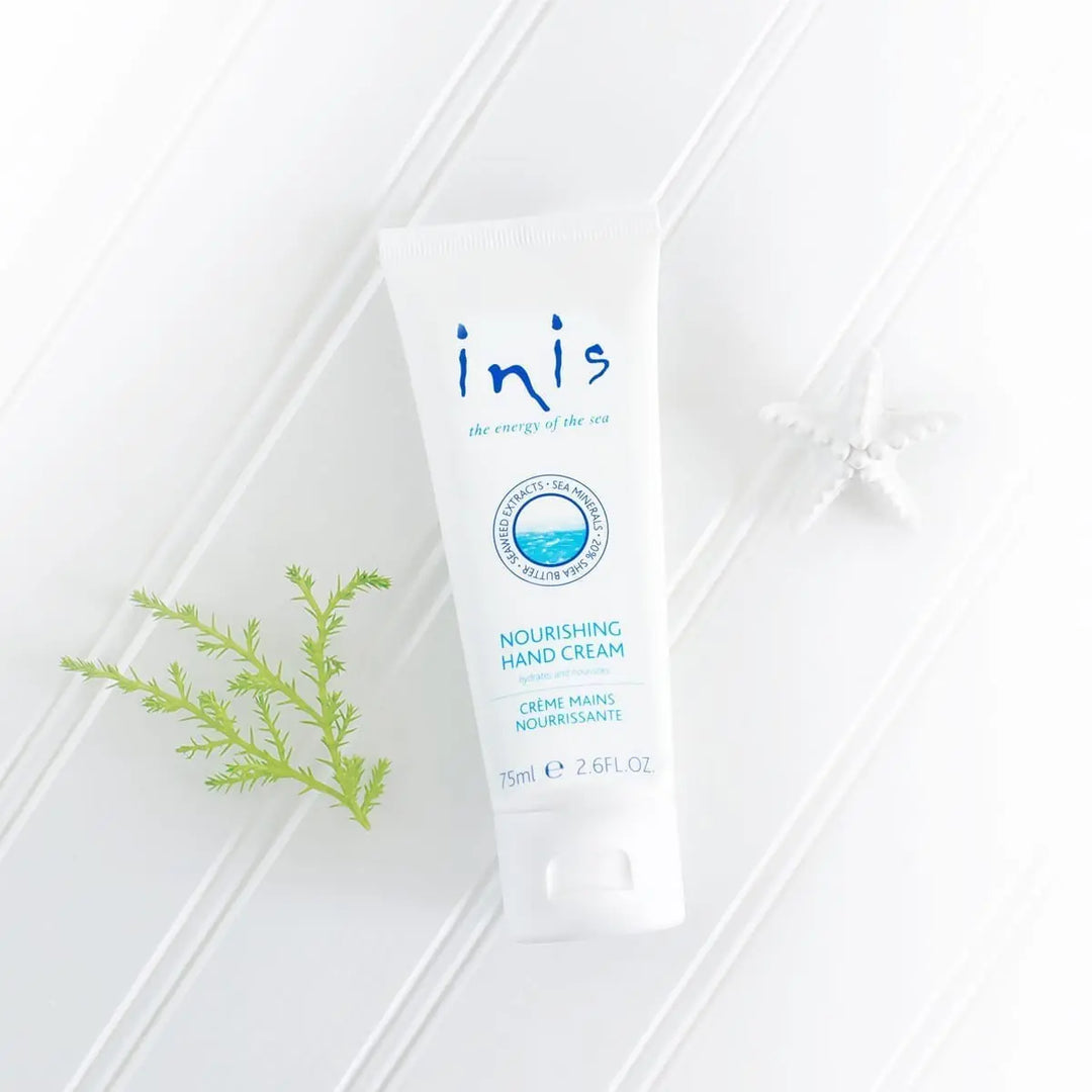 Inis Nourishing Hand Cream tube with light, clean packaging and blue-green text. Available in 30ml and 75ml sizes.