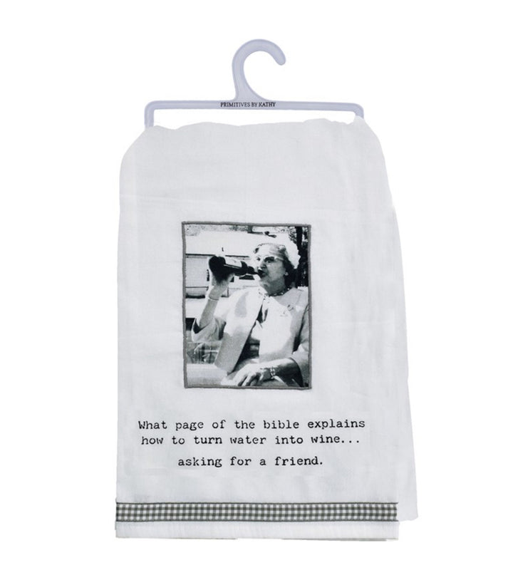 Cotton kitchen towel with humorous "turn water into wine" Bible caption. Available in 16"x28". Black and white design.
