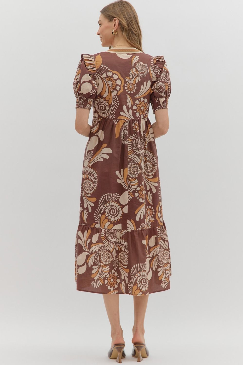 Betty Floral Dress: brown midi with puff sleeves, beige and orange floral print. Available in sizes XS–XL.