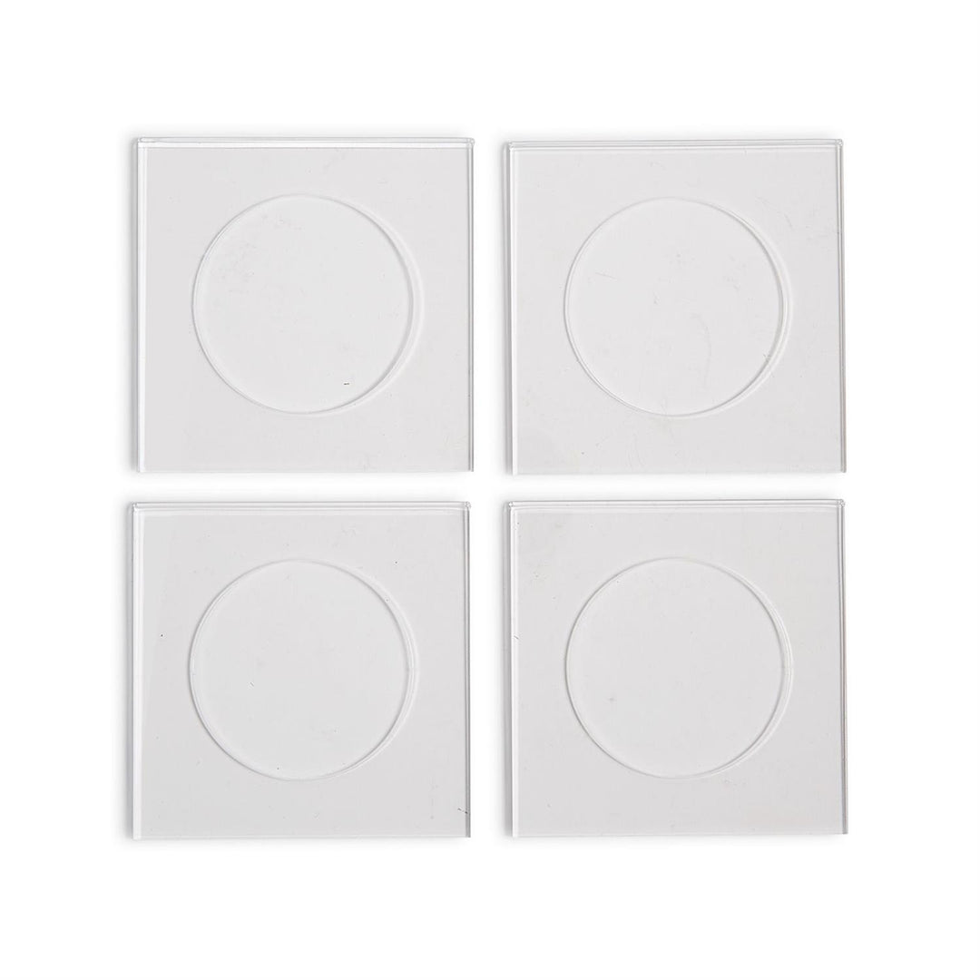 Four clear square customizable acrylic coasters with circular indented centers.