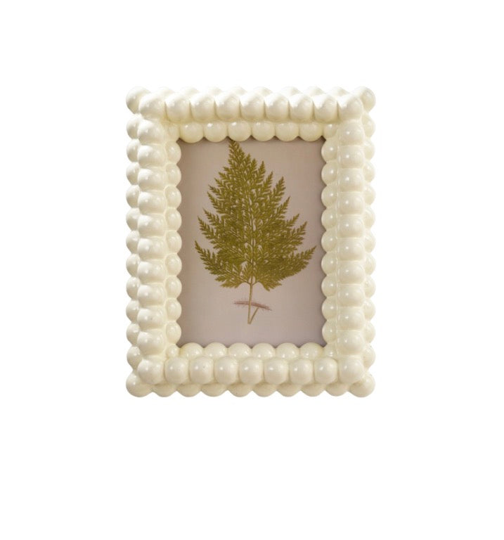 Resin & Glass Ball Photo Frame with beaded texture, displaying a vibrant green fern leaf print. Available sizes: 4x6, 5x7.