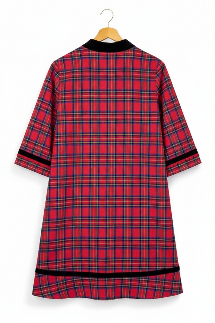 Red plaid velvet trim mini dress with black velvet trim on collar, cuffs, and hem. Available in multiple sizes.