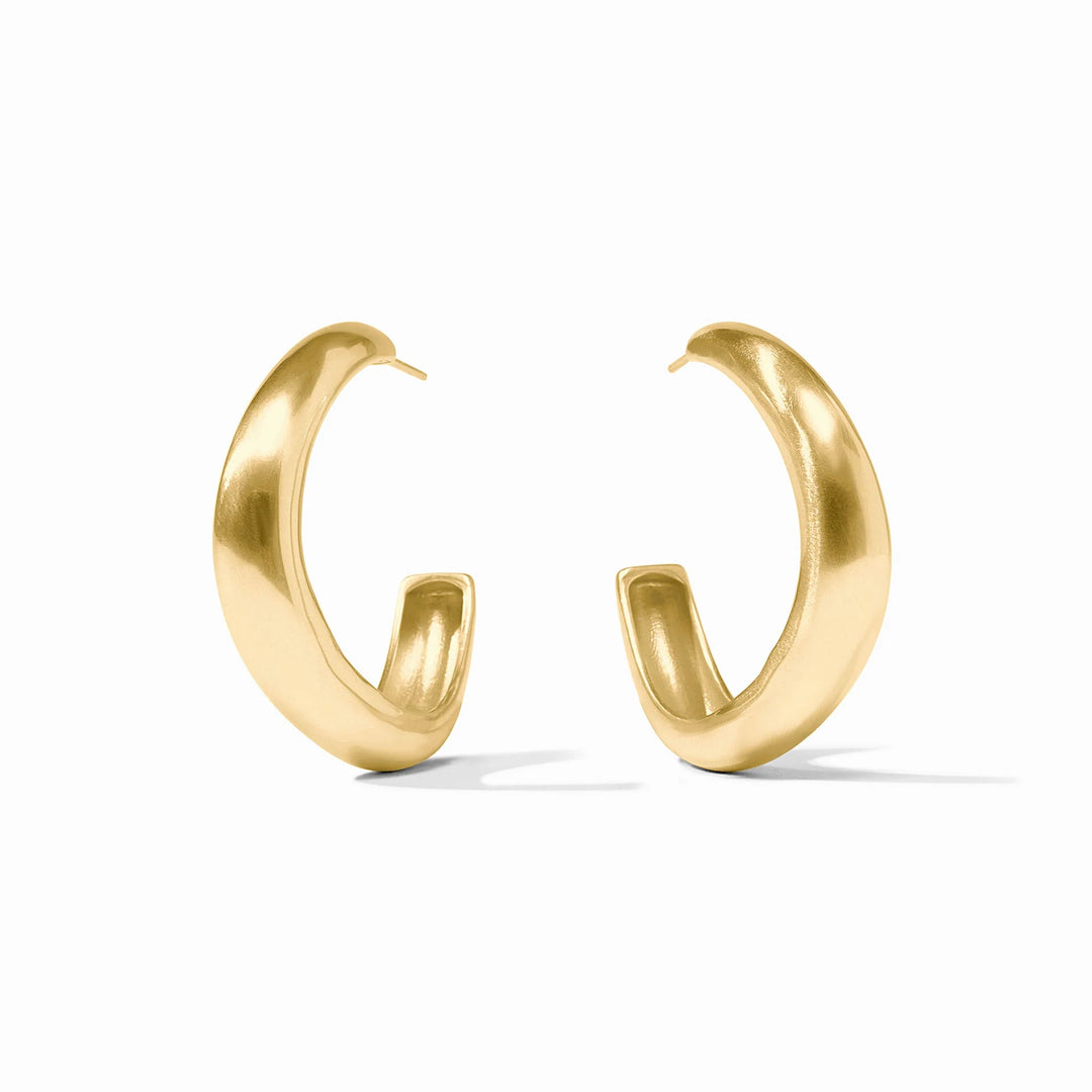 Julie Vos Wave Hoop earrings: chunky 24K gold-plated hoops with a smooth, shiny finish. Available in small, medium, large.