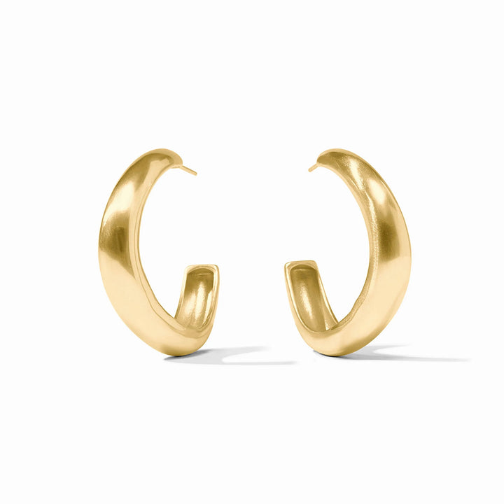Julie Vos Wave Hoop earrings: chunky 24K gold-plated hoops with a smooth, shiny finish. Available in small, medium, large.