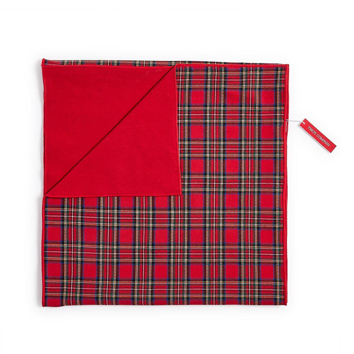Tartan Traditions Double-Sided Table Runner in red, green, and gold tartan plaid and solid red.