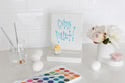 Message board with “Enjoy the Little Things” in blue; available sizes: small, medium, large.