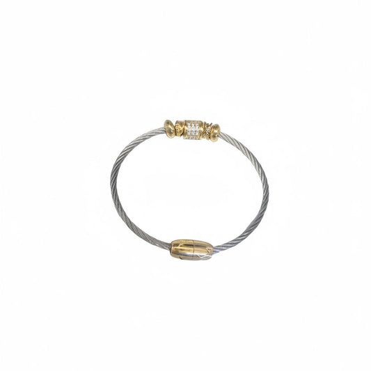 Braided silver and gold bangle with gold-tone end caps, cubic zirconia centerpiece; available in S, M, L sizes.