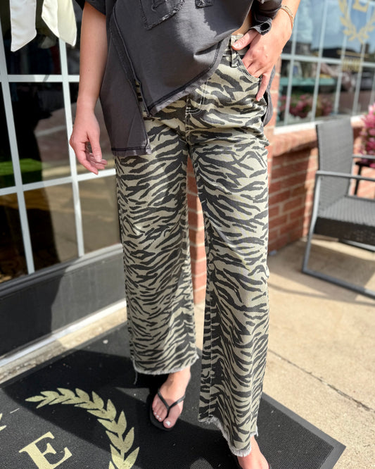Zebra Print Wide-Leg Jean with high-rise waist; available in sizes 24-32.