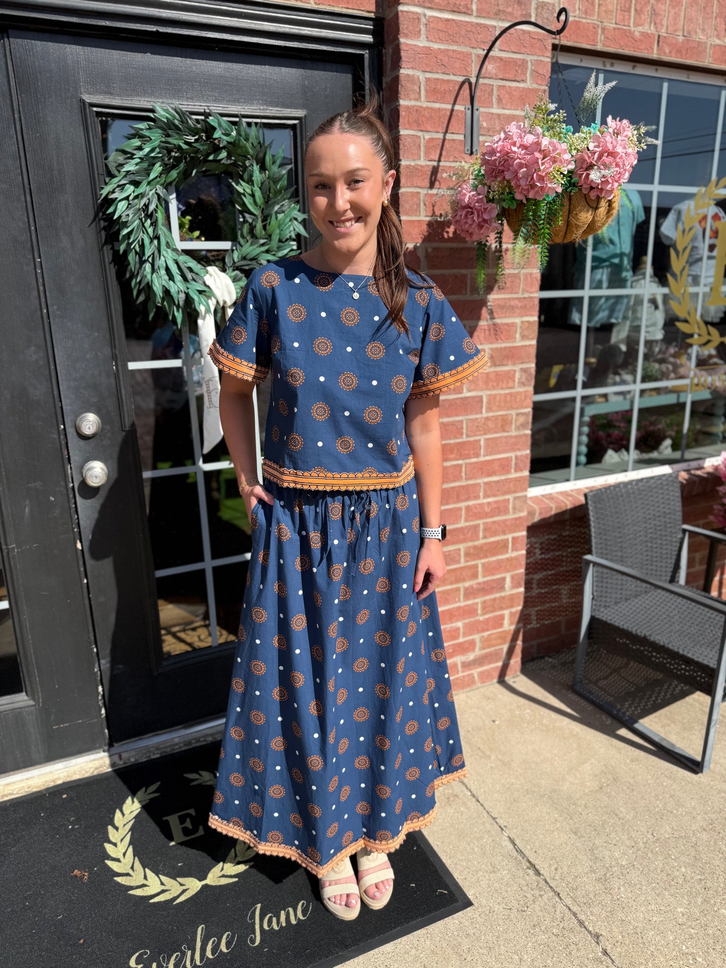Auburn Medallion Skirt Set: elegant blue and orange hand block printed two-piece skirt set, available in sizes XS-XL.