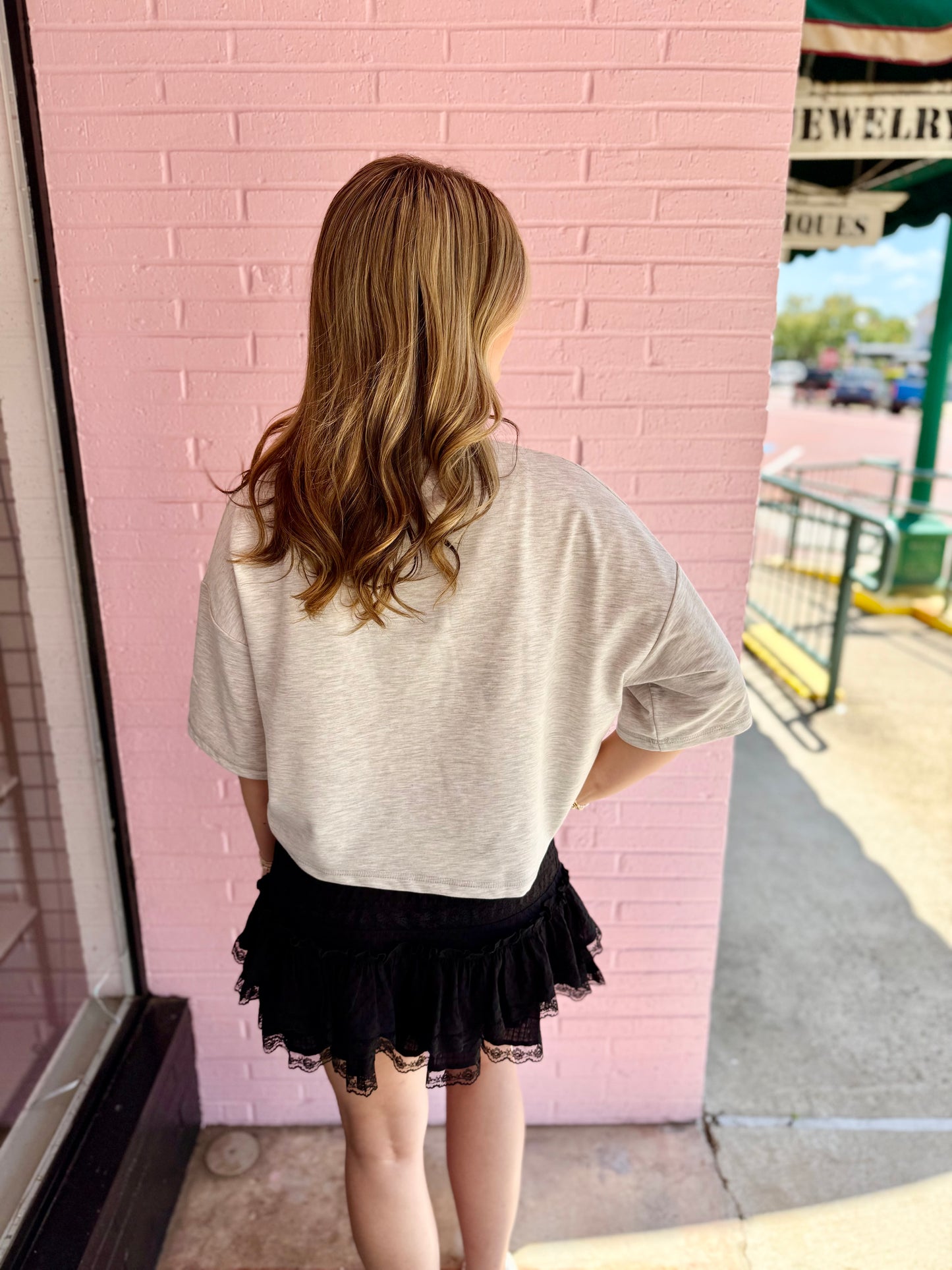 Oversized Gameday Gingham Football Patch Top available in sizes S-L.