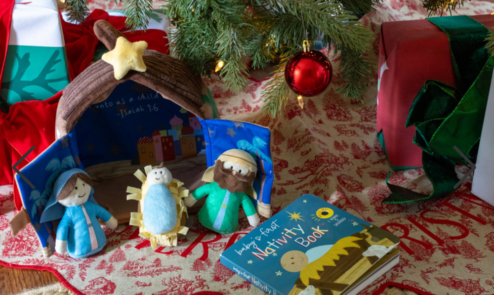 Nativity Sound Book with plush Mary, Joseph, and baby Jesus figures.