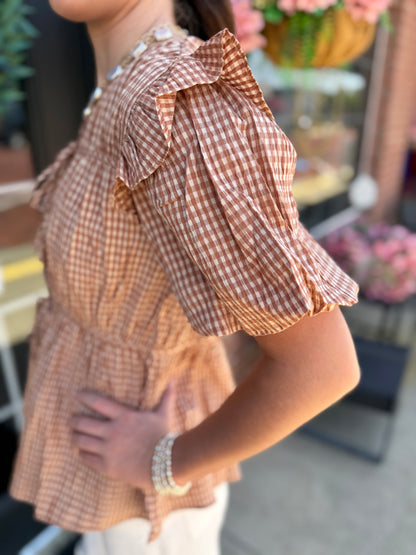 Gingham Tie Blouse with flutter sleeves. Available in sizes XS-XL.