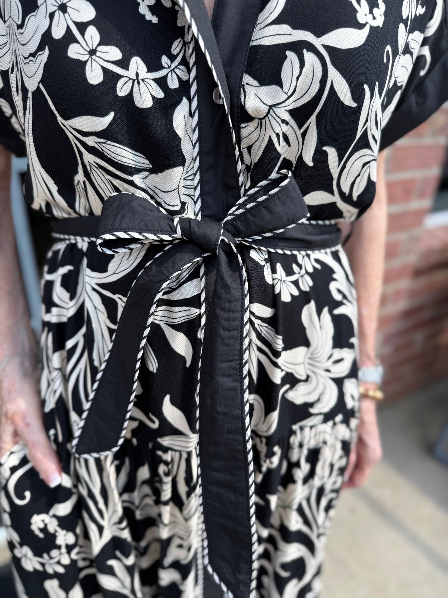 Dolman Sleeve Midi Dress with black and white floral leaf print, tied belt; available in sizes XS–XL.