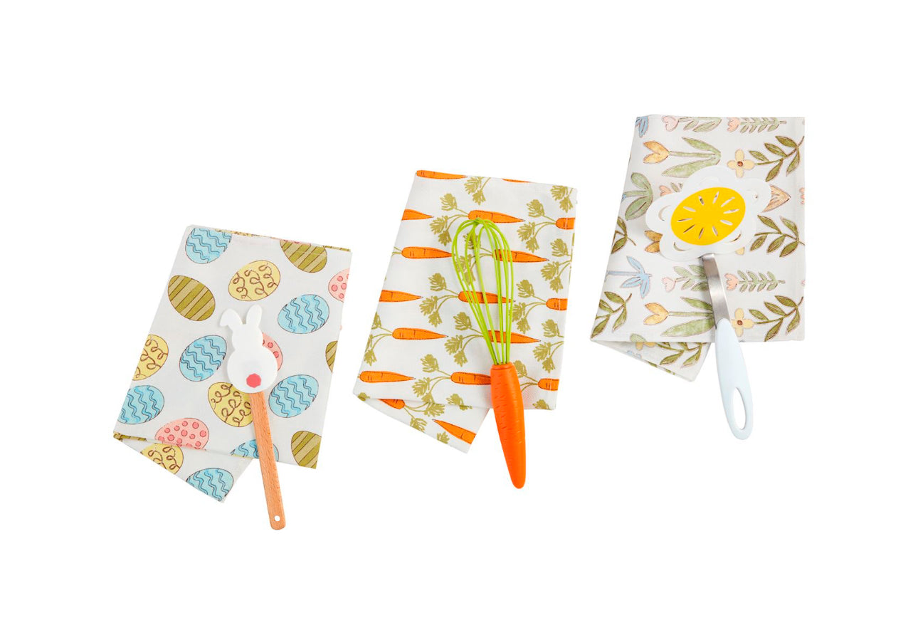Spring Towel Set: three 26"x16.5" towels with eggs, carrots, and spring prints, each paired with a matching utensil.