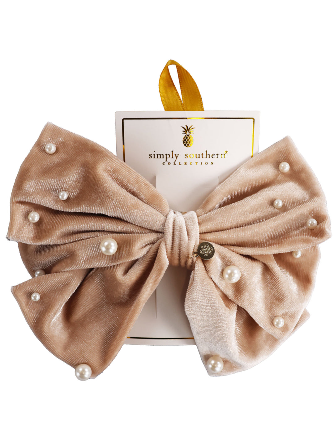 Light beige velvet bow with pearl accents. Available sizes: large.