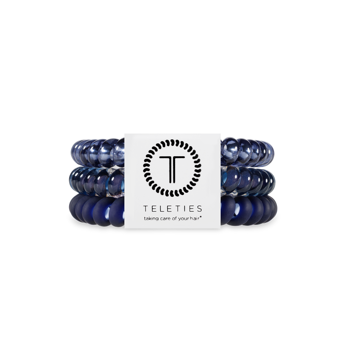 Three small Nightfall Navy spiral hair coils with a white TELETIES label. Available size: Small. Secure, comfortable hold.