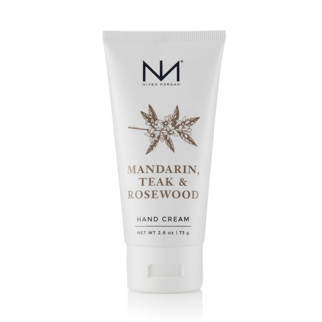 Mandarin, Teak &amp; Rosewood Travel Hand Cream in white 2.6 oz (73 g) tube with floral design and black text.