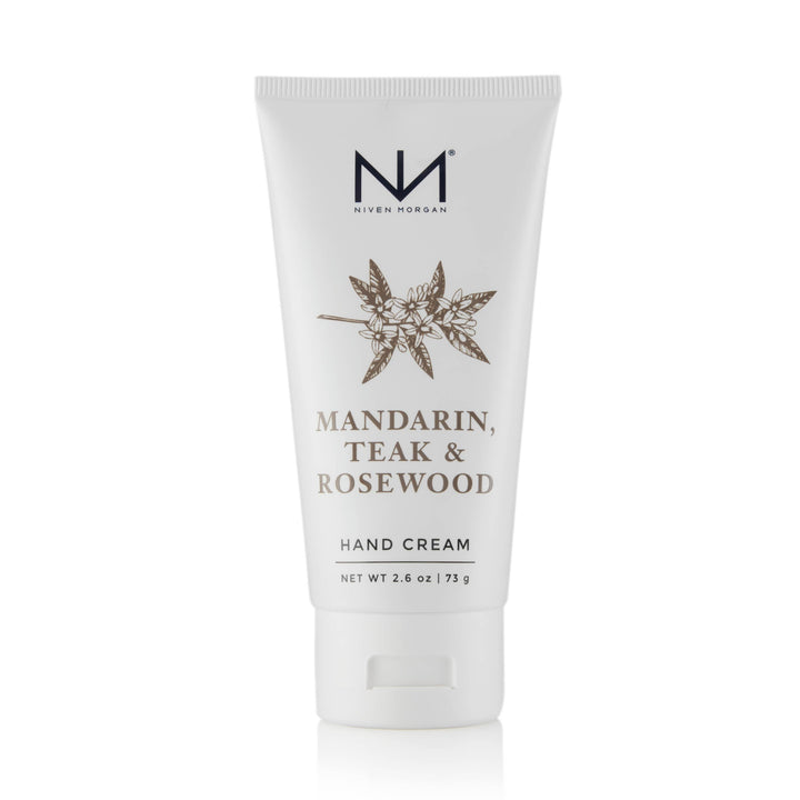 Mandarin, Teak &amp; Rosewood Travel Hand Cream in white 2.6 oz (73 g) tube with floral design and black text.