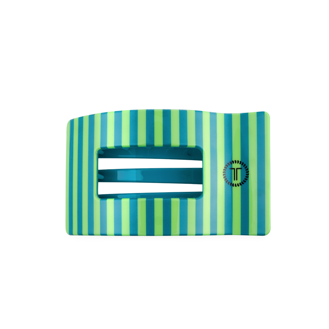 The Cabana Cutie Flat Rectangle Hair Clip by TELETIES has horizontal green and blue stripes, two central slots, a small circular logo on the right, and is available in medium size.