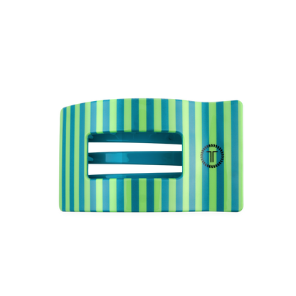 The Cabana Cutie Flat Rectangle Hair Clip by TELETIES has horizontal green and blue stripes, two central slots, a small circular logo on the right, and is available in medium size.