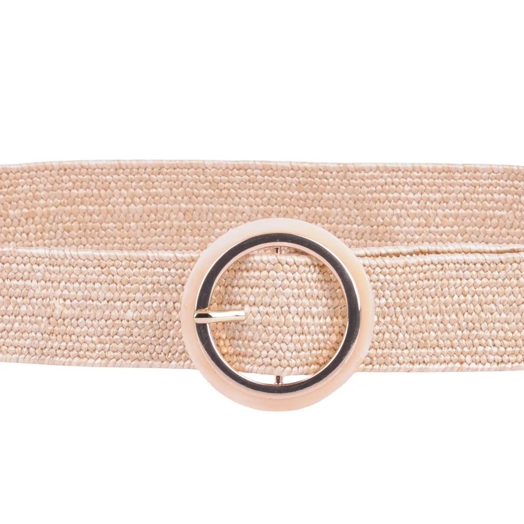 Wide beige stretch belt with large light acrylic buckle. Minimalist style. Available in S, M, L, and XL sizes.