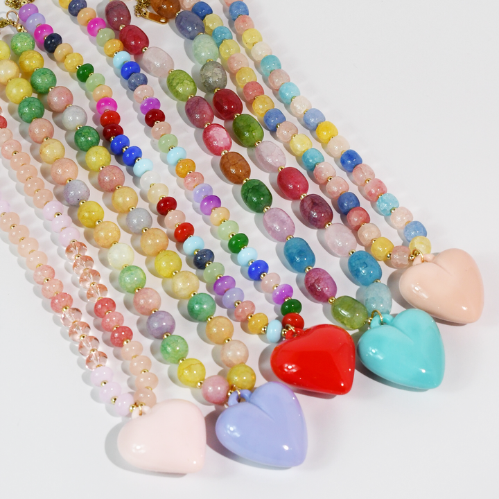 Happy Colorful Heart Necklace, two vibrant colors, bold heart pendant; available in small and large sizes.