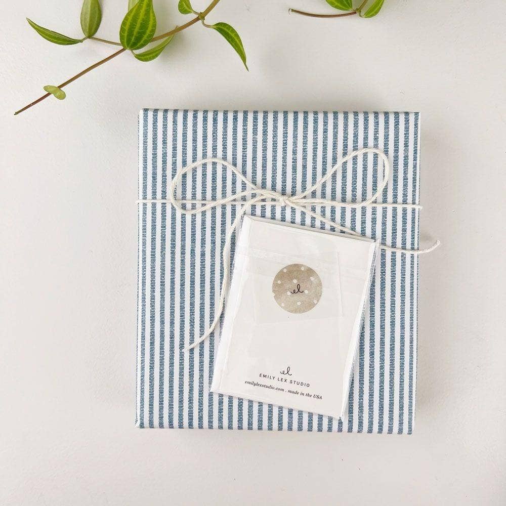Gift wrapped in blue and white striped fabric with Hobnail bouquet mini enclosure notecard. Available in mini size.