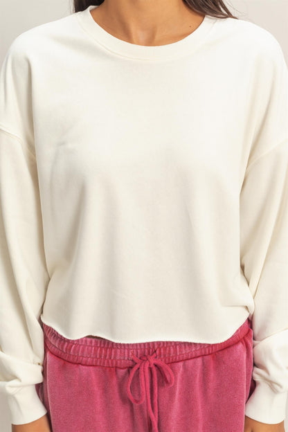 Cropped Mineral Wash Sweatshirt in white. Sizes: XS-XL.