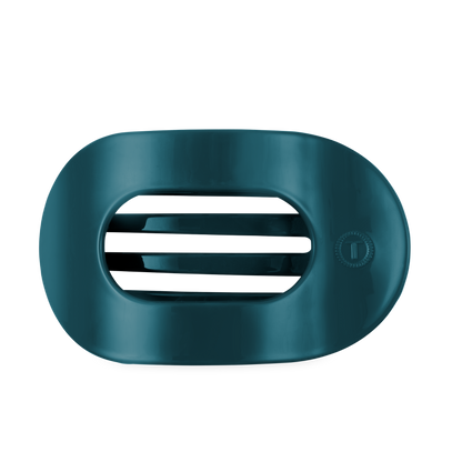 Dark teal, oval-shaped soap dish with two horizontal slats and a sleek design. Available in one size.