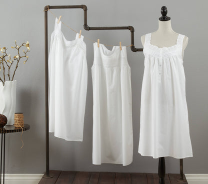 Three white scoop neck embroidered nightgowns, ideal for loungewear. Available in S, M, L.