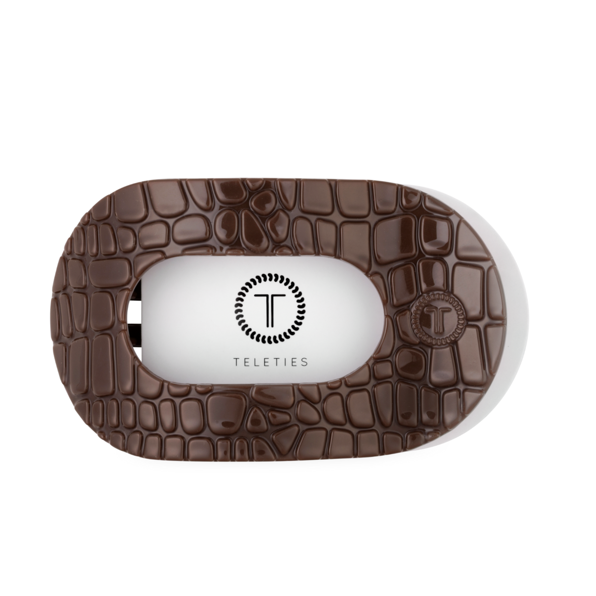 Brown Crocodile Large Flat Round Hair Clip with textured oval shape, crocodile skin pattern, and “T” logo with “TELETIES” in the center. Flat back for secure hold and comfort. Available in large size.