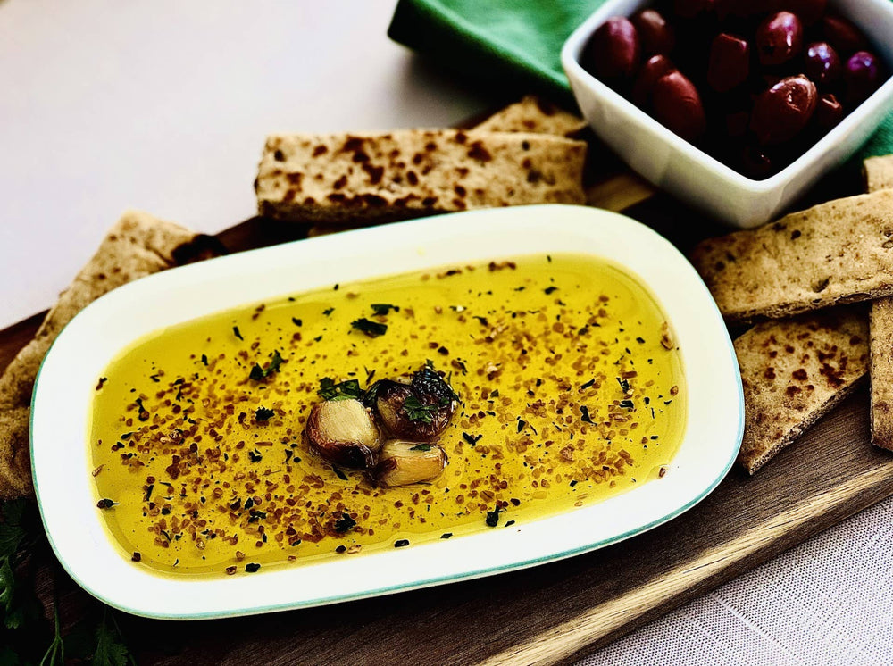 Rectangular dish with Toasted Garlic Dipping Oil Seasoning. Available in 3oz and 6oz sizes.