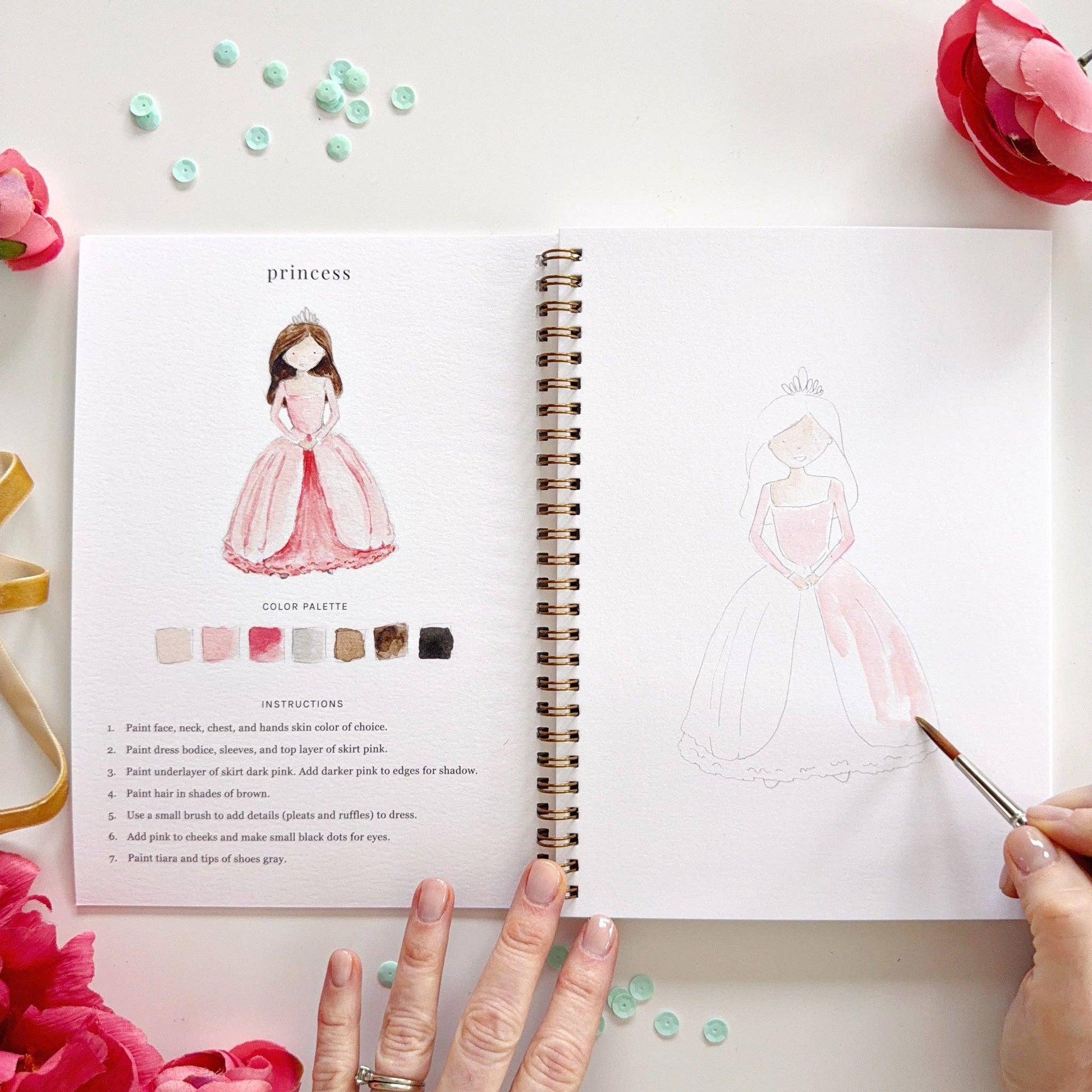 Open Fairytale Watercolor Workbook with princess painting guide; sizes available: standard (8.5"x11"), mini (5"x7").