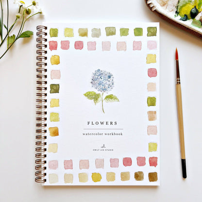 Flowers Watercolor Workbook," spiral-bound, beginner’s guide with central hydrangea art; sizes available.