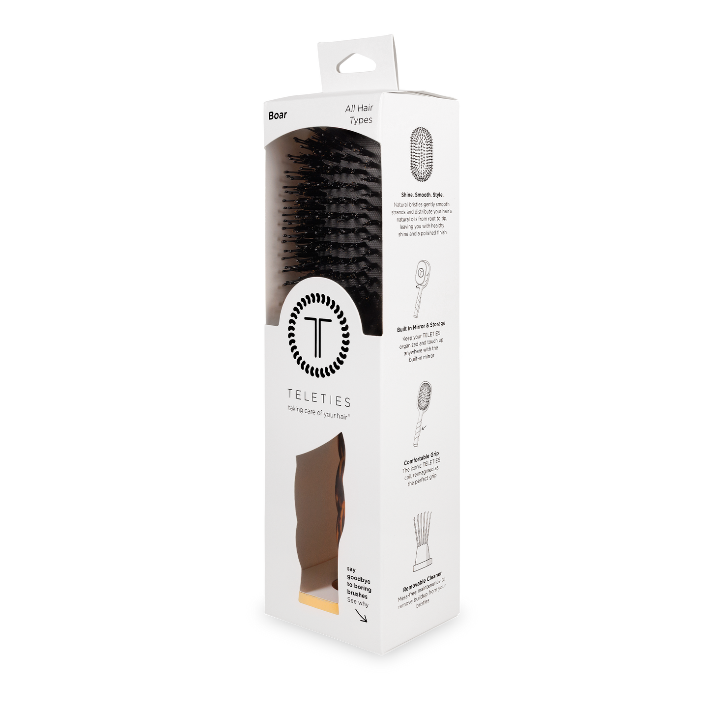 White box with clear window displaying black boar bristle hair brush; sizes available: small, medium, large.