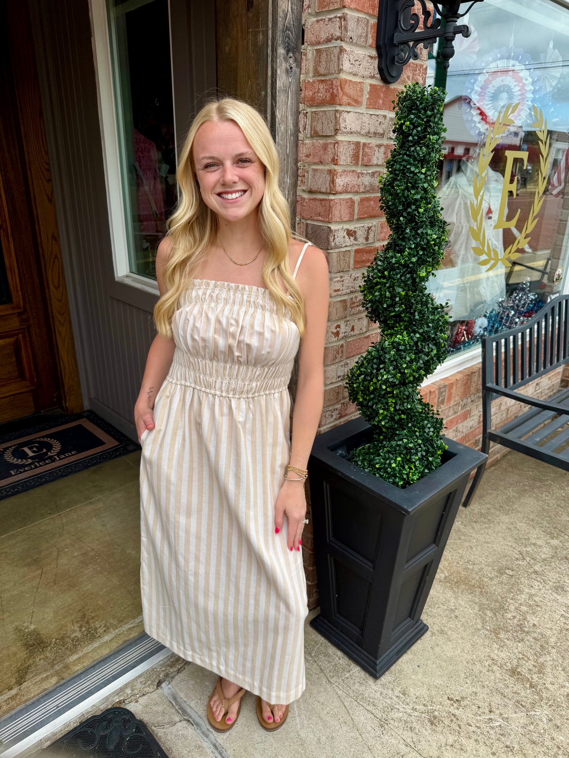 Taupe Striped Spaghetti Strap Midi Dress; available in sizes XS-XL.