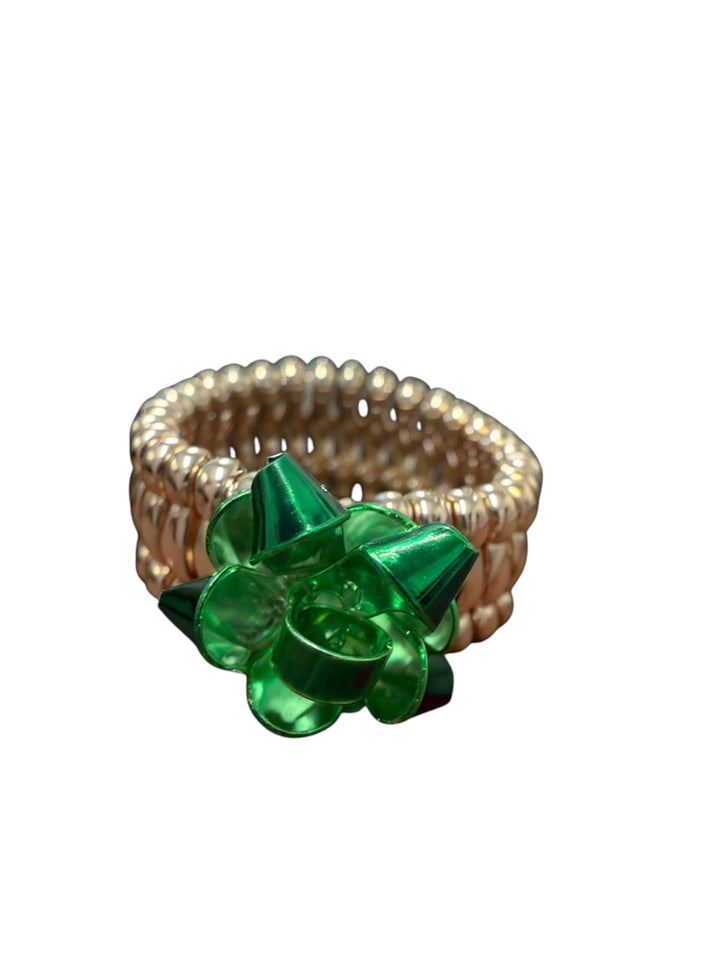 Gift Bow Stretch Ring with a metallic green bow on a gold-toned bead band.