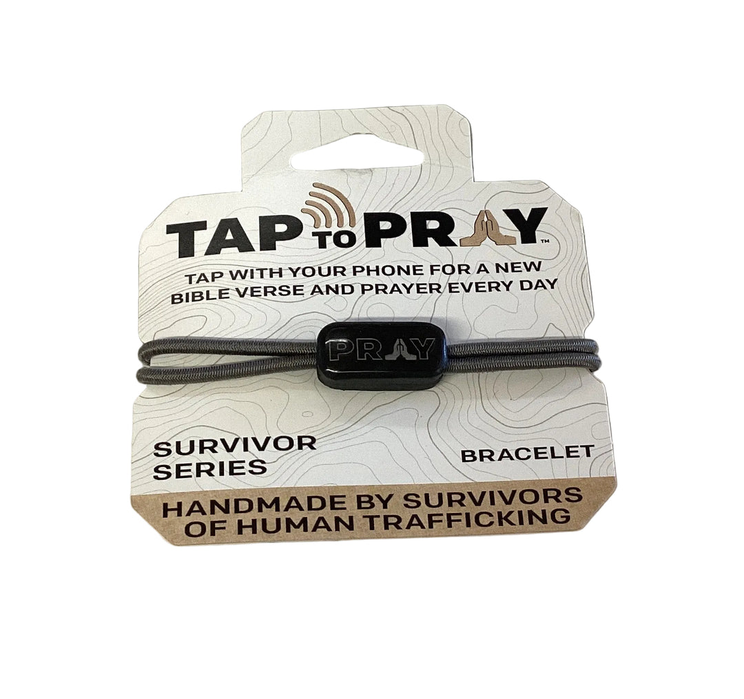Tap To Pray Bracelet with elastic cord, black “PRAY” bead, and branded display card. Available in various sizes.