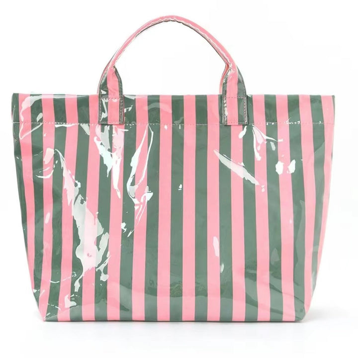 Striped Tote Bags with vertical pink and green stripes, short handles, glossy finish, lightweight, large capacity. Sizes: S, M, L.
