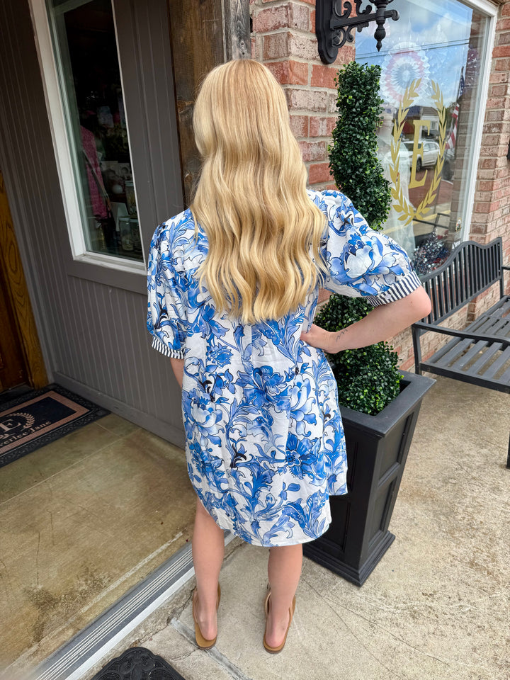 Royal Blue Floral Dress with flowing fit. Available in sizes XS–XL.