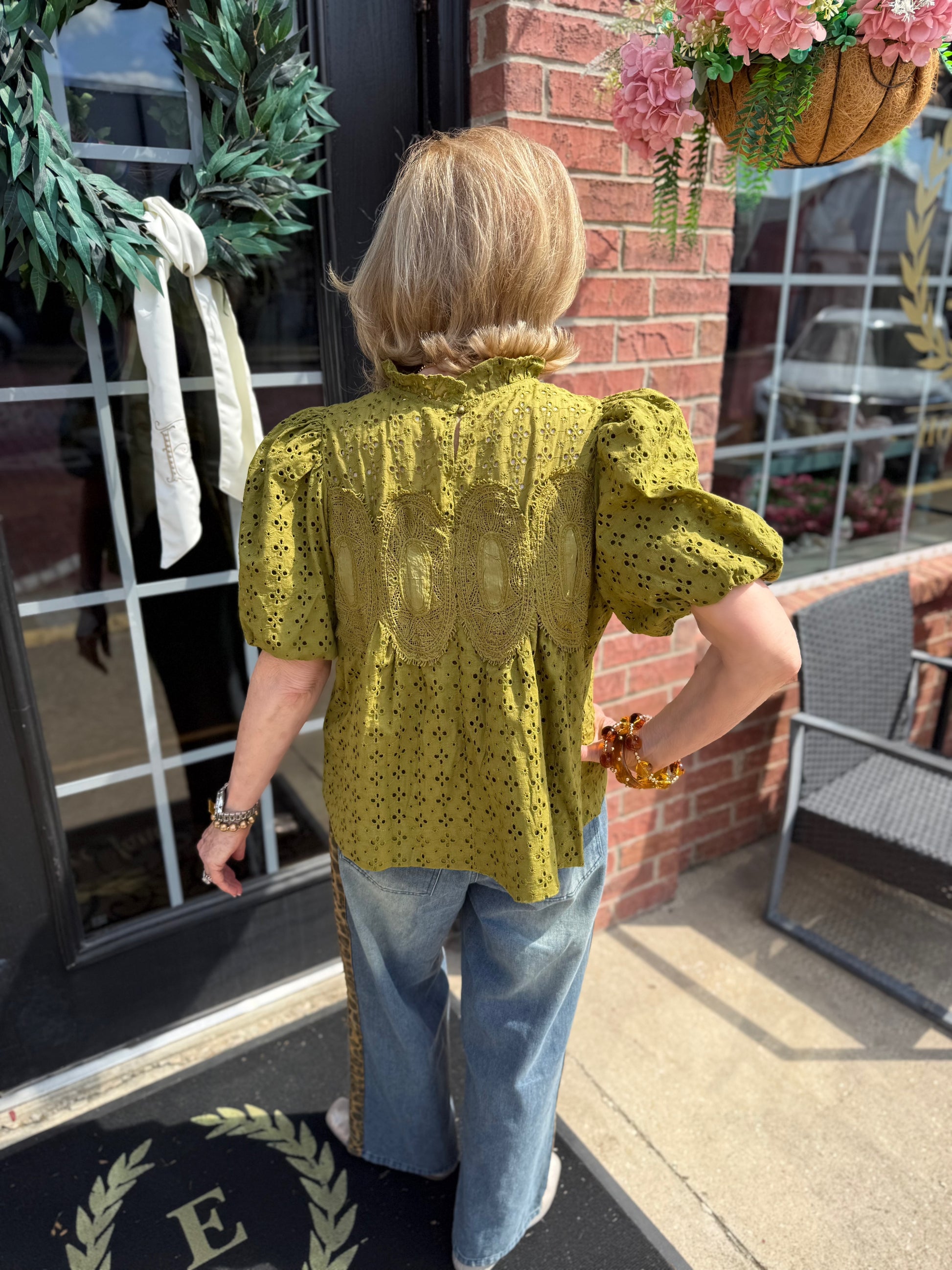 Green Ruffled Eyelet Puff Sleeve Top, available in sizes XS–XL.