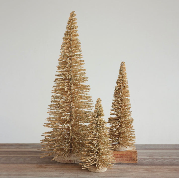 Three gold-toned Willow Wood Glitter Tree bottle brush trees of varying heights.