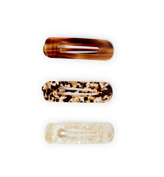 Three fashionable Oversize Claw Clips: 
1. Tortoiseshell pattern
2. Mix of beige, brown, and black colors
3. Pearly white finish

Available sizes: Rectangular, oversized design