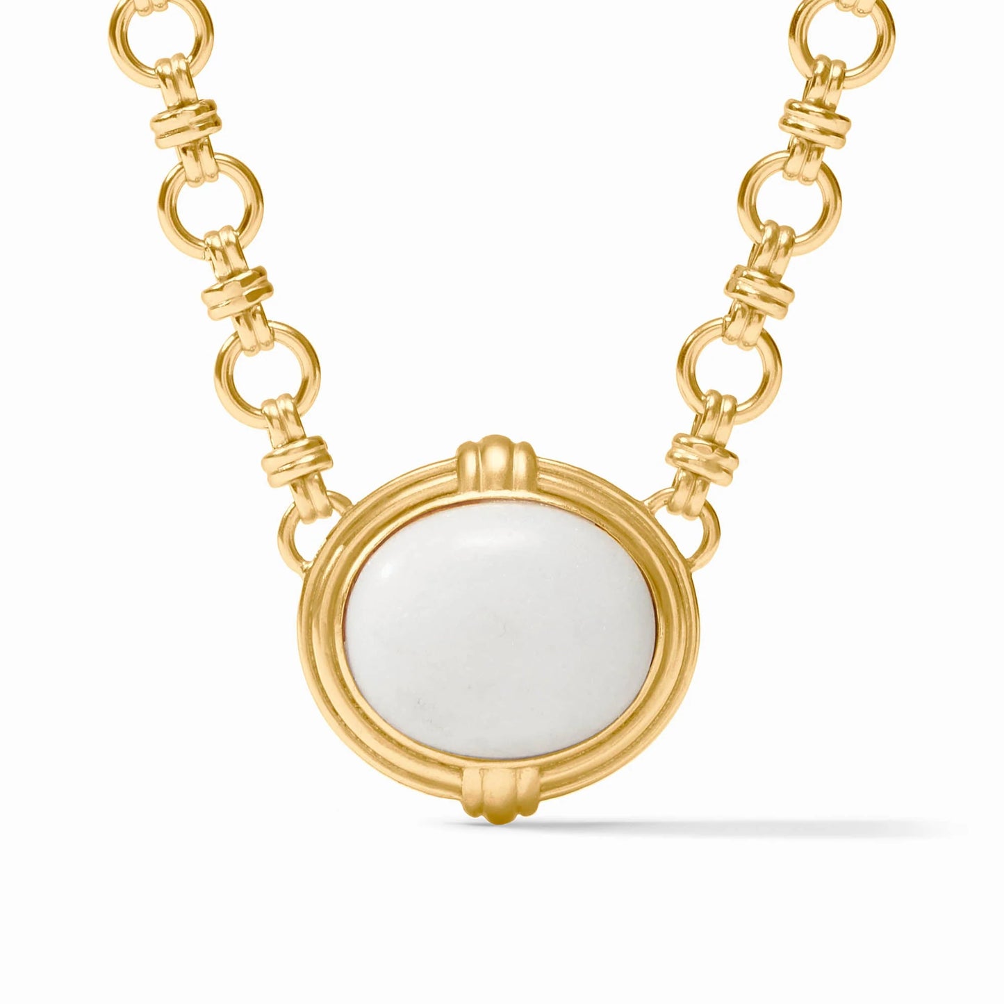 Round white jade pendant in 24K gold plate bezel on linked chain. Available sizes: 16", 18", 20".